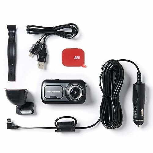 Dashcam and accessories including cables, mount, and adhesive pad.